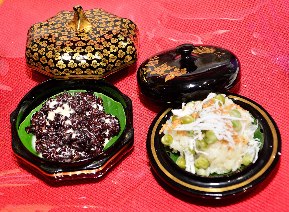 Kaung Nying Paung or steamed sticky rice with salted sesame pounder and scrapped coconut