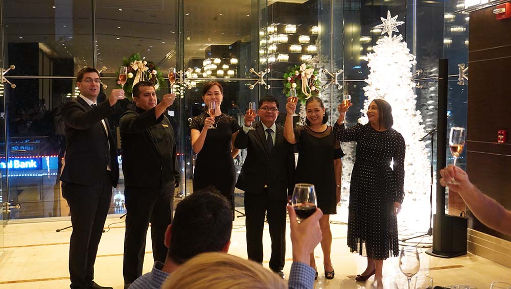 Ascott BGC Manila General Manager Sue Ponnudurai with the Head of Departments toasting for the property's 5th Anniversary