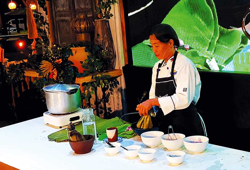 A cook preparing tinu-om of Cabatuan copy