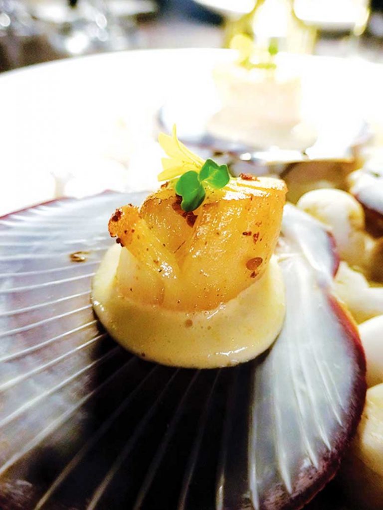 Scallop with Sea Urchin Mousse, Green Pea Emulsion, and Micro Arugula