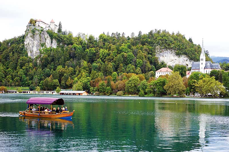 Lake Bled with Bled Castle (L) and St Martina Parish Church (R)